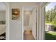 Bathroom with neutral tile, tub-shower combo, and access to the backyard at 10945 Sundrift Dr, Tampa, FL 33647