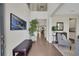 Bright and airy foyer with hardwood floors and soaring ceilings, showcasing an elegant entry at 10945 Sundrift Dr, Tampa, FL 33647