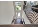 The home features a large foyer with hardwood floors and views of the front yard at 10945 Sundrift Dr, Tampa, FL 33647