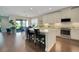 Modern kitchen featuring a large island, stainless steel appliances, and sleek white cabinetry at 10945 Sundrift Dr, Tampa, FL 33647