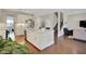 Modern kitchen island boasts ample counter space, stainless steel appliances, and stylish cabinets at 10945 Sundrift Dr, Tampa, FL 33647