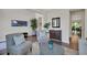 Comfortable living room featuring stylish seating, decor, and ample natural light at 10945 Sundrift Dr, Tampa, FL 33647