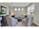 Cozy living room with neutral tones, accent furniture, and natural light at 10945 Sundrift Dr, Tampa, FL 33647