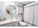 Bathroom featuring modern shower, vanity with marble counter, updated toilet and fixtures at 1106 Humble Haven St, Ruskin, FL 33570