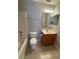 Standard bathroom features a bathtub, toilet, sink and vanity, and a mirrored medicine cabinet at 11102 Summer Star Dr, Riverview, FL 33579