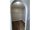 Spacious walk-in closet with dark wood flooring and metal shelving for optimal storage at 11102 Summer Star Dr, Riverview, FL 33579