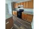 Kitchen features updated appliances, granite counters, and ample cabinet space at 11102 Summer Star Dr, Riverview, FL 33579