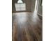 Living room features new floors and neutral paint with natural light and a ceiling fan at 11102 Summer Star Dr, Riverview, FL 33579
