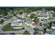 Overhead shot of a quiet neighborhood showcasing neatly arranged houses and tree-lined streets at 11305 Brown Bear Ln, Port Richey, FL 34668