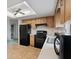 Functional kitchen design boasting modern appliances and ample storage for efficient cooking and meal preparation at 11305 Brown Bear Ln, Port Richey, FL 34668
