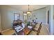 Formal dining area with an elegantly appointed table and sophisticated decor at 11408 Coventry Grove Cir, Lithia, FL 33547