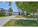 Charming single-story home with well-manicured lawn, beautiful landscaping, and a two car garage at 11408 Coventry Grove Cir, Lithia, FL 33547