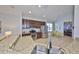 Modern kitchen featuring stainless steel appliances, granite countertops, and dark wood cabinetry at 11408 Coventry Grove Cir, Lithia, FL 33547