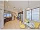 Bright eat-in kitchen with an island, stainless steel appliances, granite counters, and dark wooden cabinets at 11408 Coventry Grove Cir, Lithia, FL 33547