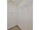 A walk-in closet with a wire shelving system at 11408 Coventry Grove Cir, Lithia, FL 33547