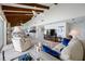 Spacious living area with vaulted ceilings, water views, and an open floor plan at 1351 Gulf Blvd # 209, Clearwater Beach, FL 33767