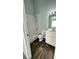 Bathroom with vanity, mirror, and shower/tub combo at 1400 Costa Mesa Dr, Wesley Chapel, FL 33543