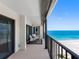 Balcony with seating offering stunning ocean views at 1480 Gulf Blvd # 1004, Clearwater Beach, FL 33767