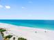 Wide beach view highlighting the beautiful shoreline and sparkling ocean on a clear day at 1480 Gulf Blvd # 1004, Clearwater Beach, FL 33767