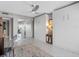 Bedroom with a murphy bed with the door open to the balcony to overlook the ocean view at 1480 Gulf Blvd # 1004, Clearwater Beach, FL 33767