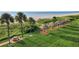 Beautiful landscaped grounds featuring picnic area and tiki hut lounge spaces at 1480 Gulf Blvd # 1004, Clearwater Beach, FL 33767
