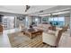 Inviting living room showcasing a modern decor, water view, and cozy seating arrangement at 1480 Gulf Blvd # 1004, Clearwater Beach, FL 33767