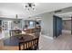 Spacious living room with tile flooring, dining area, and comfortable seating at 1480 Gulf Blvd # 1004, Clearwater Beach, FL 33767