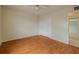 Bedroom with wood floors and closet at 1509 Cherry Hills Dr, Sun City Center, FL 33573