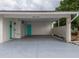 Exterior covered car port at 1509 Cherry Hills Dr, Sun City Center, FL 33573