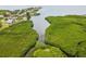 Breathtaking aerial shot of mangrove islands connected by winding waterways and waterfront homes at 1532 Citrine Trl, Tarpon Springs, FL 34689