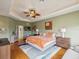 Comfortable primary bedroom features a spacious layout, and relaxing decor at 1532 Citrine Trl, Tarpon Springs, FL 34689