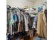Walk-in closet with plenty of hanging and storage space at 1532 Citrine Trl, Tarpon Springs, FL 34689