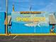 The Sponge Factory signage in Tarpon Springs is a vibrant attraction with its yellow lettering and colorful building at 1532 Citrine Trl, Tarpon Springs, FL 34689