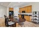 A kitchen with a breakfast bar, tile floors, and bright, contrasting colors at 1532 Citrine Trl, Tarpon Springs, FL 34689