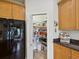 Well-organized walk-in pantry with shelving for ample storage at 1532 Citrine Trl, Tarpon Springs, FL 34689