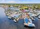 Waterfront scene with multiple boats docked, showcasing the active harbor and access to recreational boating at 1532 Citrine Trl, Tarpon Springs, FL 34689