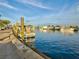 Waterfront featuring docks with boats, and a clear blue sky, reflecting a vibrant maritime atmosphere at 1532 Citrine Trl, Tarpon Springs, FL 34689