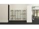 Gym storage with shelves, and view of weight-training machines and equipment at 16963 Warm Hand Ct, Land O Lakes, FL 34638