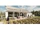 Rendering of the outdoor kitchen and covered seating area with views of the garden at 16963 Warm Hand Ct, Land O Lakes, FL 34638
