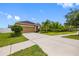Well-maintained single-story home with a two-car garage and inviting curb appeal at 1811 Redmond Brook Ln, Ruskin, FL 33570