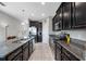 Beautiful kitchen boasting granite countertops, stainless steel appliances, and ample cabinet space at 1811 Redmond Brook Ln, Ruskin, FL 33570