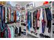 Spacious walk-in closet with ample storage, shelving, and hanging space for an organized wardrobe at 1811 Redmond Brook Ln, Ruskin, FL 33570