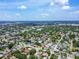 Panoramic aerial view showing a vibrant neighborhood with lush tree coverage at 233 24Th N St, St Petersburg, FL 33713