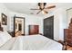 Classic bedroom showcasing hardwood floors, a ceiling fan, and traditional-style furniture and decor at 233 24Th N St, St Petersburg, FL 33713