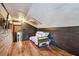 Bright bedroom with hardwood floors and mounted TV at 233 24Th N St, St Petersburg, FL 33713