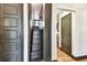 Stairway with hardwood steps and views into other areas of the home at 233 24Th N St, St Petersburg, FL 33713