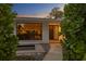 Inviting front entrance featuring a modern water feature and lush landscaping at 2665 Clubhouse N Dr, Clearwater, FL 33761