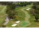 Panoramic aerial shot capturing the lush fairways and sand traps of a meticulously designed golf course at 2665 Clubhouse N Dr, Clearwater, FL 33761