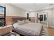 Spacious main bedroom offering natural light, modern furniture, and sleek decor elements at 2665 Clubhouse N Dr, Clearwater, FL 33761
