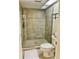 Modern bathroom with a glass-enclosed tiled shower and updated fixtures at 29129 Bay Hollow Dr # 3201, Wesley Chapel, FL 33543